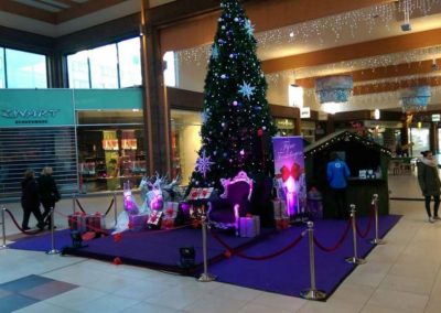 Kerstman opzet in winkelcentrum - december-entertainment.nl